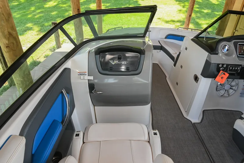 Slide: The Image of 2019 Chaparral Vortex 2430 VRX boat interior with modern dashboard and seating. - 30