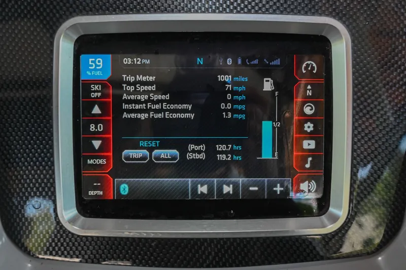 Slide: The Image of Dashboard display of a 2019 Chaparral Vortex 2430 VRX showing trip and fuel data. - 51