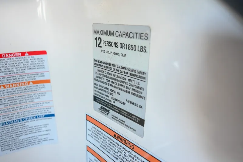 Slide: The Image of 2019 Chaparral Vortex 2430 VRX capacity label, maximum 12 persons or 1850 lbs. - 52