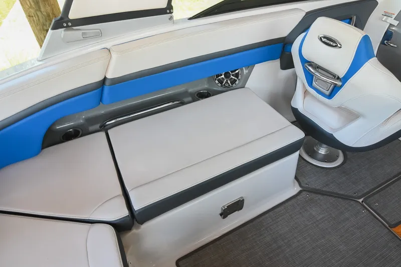 Slide: The Image of 2019 Chaparral Vortex 2430 VRX boat interior with blue and white seating. - 27