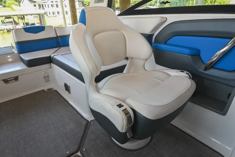 Slide: The Image of 2019 Chaparral Vortex 2430 VRX interior with white and blue seating, modern design. - 35