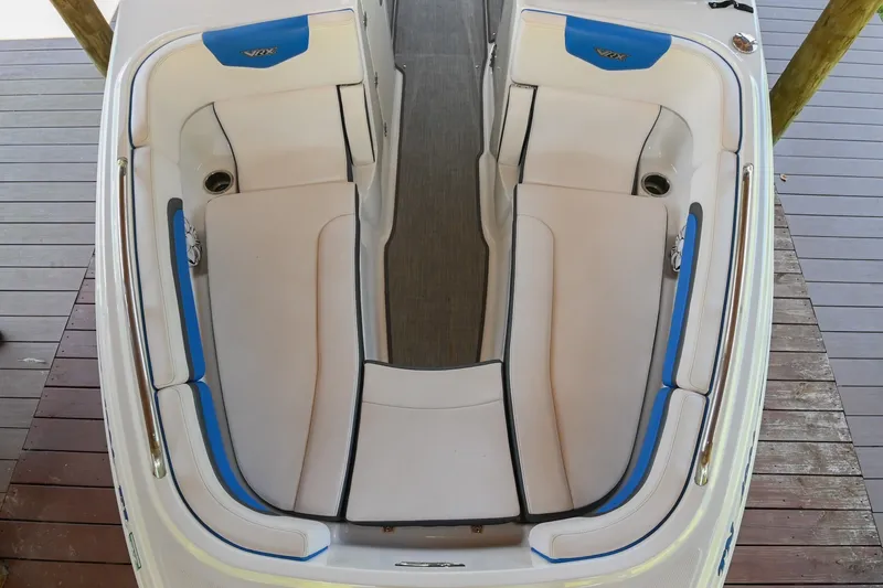 Slide: The Image of 2019 Chaparral Vortex 2430 VRX boat interior with white and blue seating. - 43