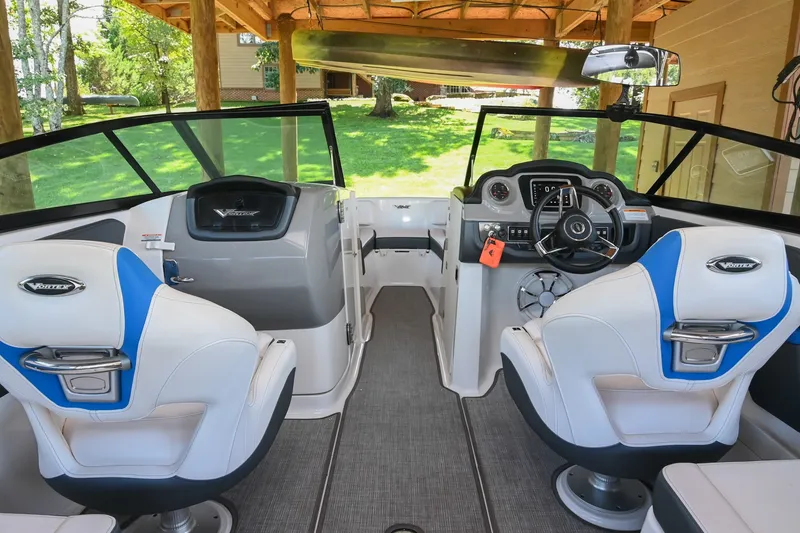 Slide: The Image of Interior of a 2019 Chaparral Vortex 2430 VRX boat with modern seating and controls. - 28