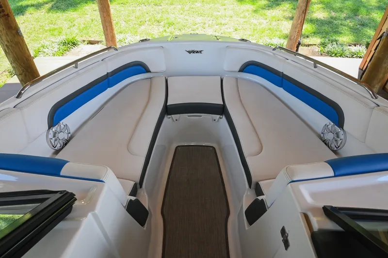 Slide: The Image of 2019 Chaparral Vortex 2430 VRX boat interior with blue and white seating. - 42