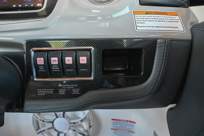 Slide: The Image of Control panel of 2019 Chaparral Vortex 2430 VRX with switches and warning label. - 40