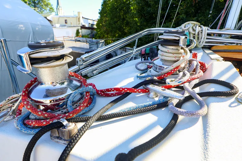 Slide: The Image of Sailboat deck with colorful ropes and winches, Ericson 32.5, 1990 model. - 22