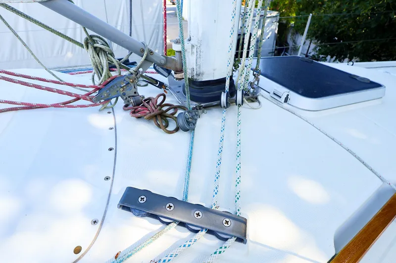 Slide: The Image of Deck of 1990 Ericson 32.5 sailboat with rigging and ropes. - 17