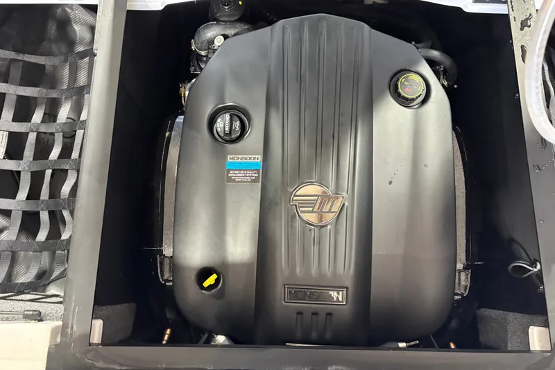 Slide: The Image of 2023 Malibu Wakesetter 21 LX engine compartment with Monsoon engine. - 5
