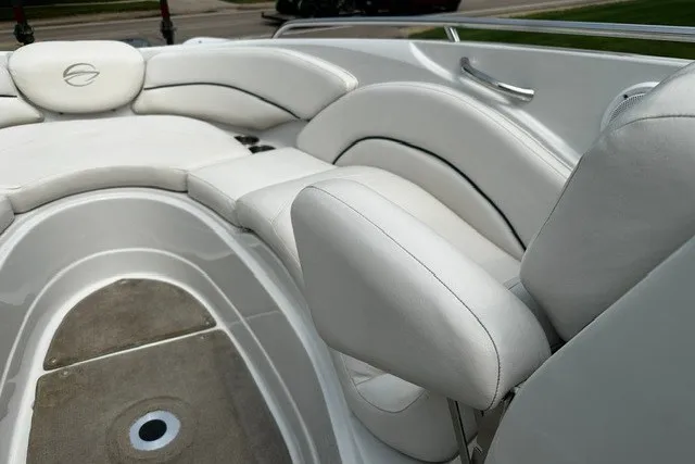 Slide: The Image of 2007 Crownline 260 LS boat interior with white leather seating. - 21