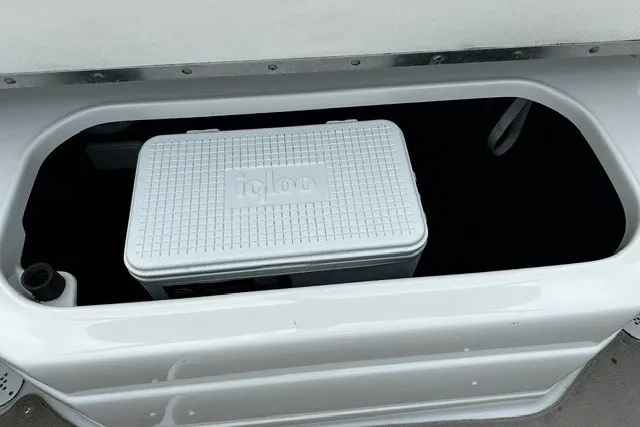 Slide: The Image of White Igloo cooler inside 2007 Crownline 260 LS boat storage compartment. - 10