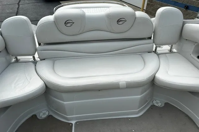 Slide: The Image of 2007 Crownline 260 LS boat interior with white leather seating. - 9