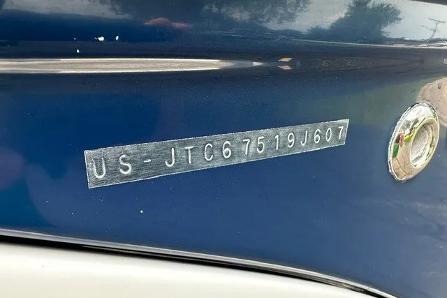 Slide: The Image of 2007 Crownline 260 LS boat hull identification number (HIN) on blue surface. - 33