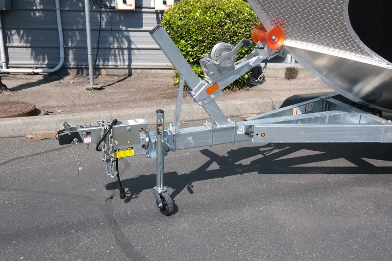 Slide: The Image of Trailer hitch of 2026 Hewescraft 190 Sea Runner ET on pavement. - 19