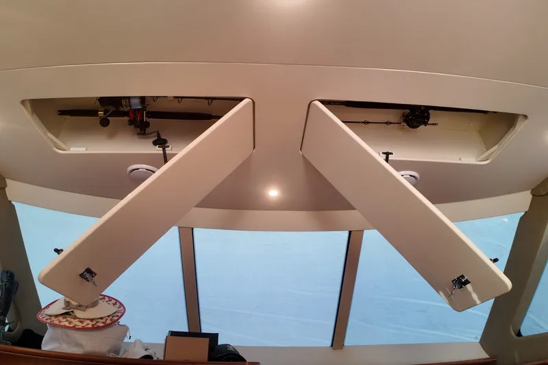 Slide: The Image of Interior view of 2007 Silverton 38 Convertible yacht with open ceiling compartments. - 32