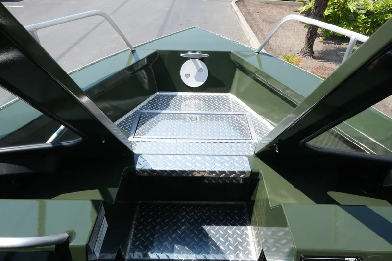Slide: The Image of 2022 Hewescraft 190 Sea Runner ET Hardtop boat interior with diamond plate flooring. - 15