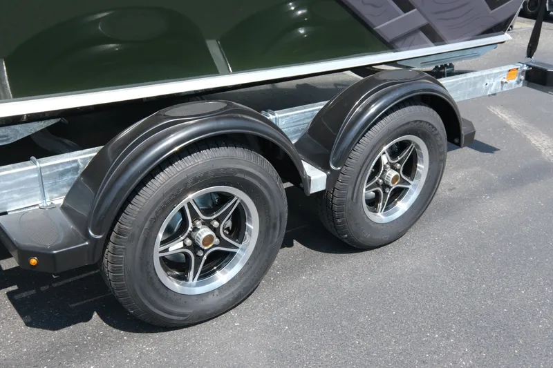 Slide: The Image of Trailer wheels of 2022 Hewescraft 190 Sea Runner ET Hardtop on asphalt. - 16