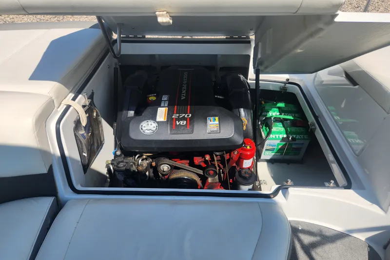 Slide: The Image of 2012 Cobalt 220 boat engine compartment with Volvo Penta 270 V8 engine. - 4