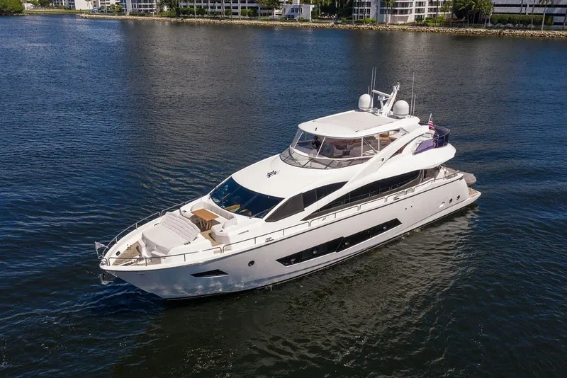 Slide: The Image of Luxurious 2019 Sunseeker 86 Yacht cruising on serene waters, showcasing sleek design and elegance. - 6