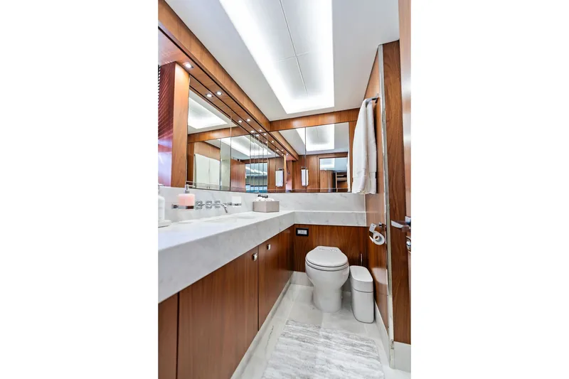 Slide: The Image of Luxurious bathroom interior on 2019 Sunseeker 86 Yacht, featuring elegant wood and marble finishes. - 78
