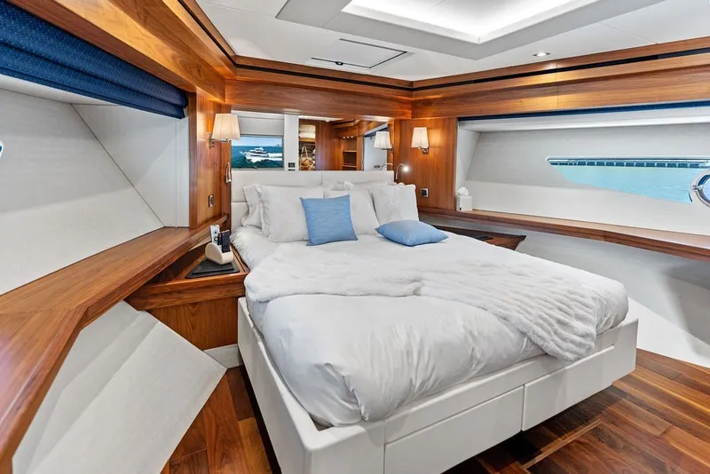 Slide: The Image of Luxurious bedroom interior of 2019 Sunseeker 86 Yacht with elegant wood finishes. - 105