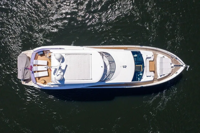 Slide: The Image of Aerial view of 2019 Sunseeker 86 Yacht cruising on water. - 11
