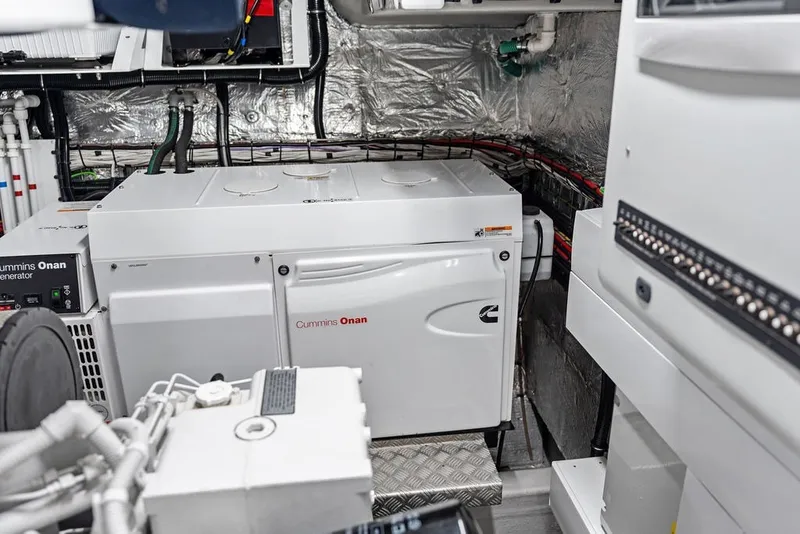 Slide: The Image of Engine room of 2019 Sunseeker 86 Yacht featuring Cummins Onan generator. - 143