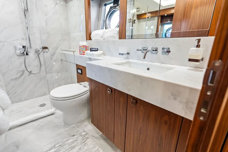 Slide: The Image of Luxurious bathroom in 2019 Sunseeker 86 Yacht with marble and wood finishes. - 96