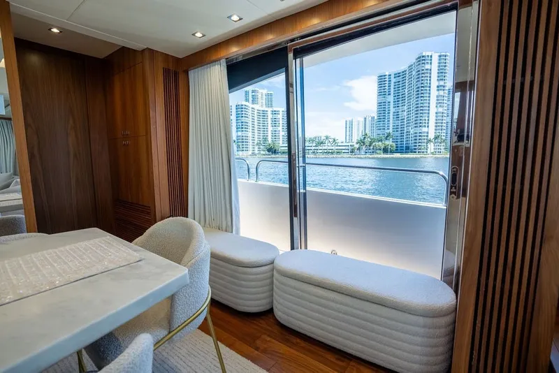 Slide: The Image of Luxurious interior of 2019 Sunseeker 86 Yacht with waterfront view. - 70