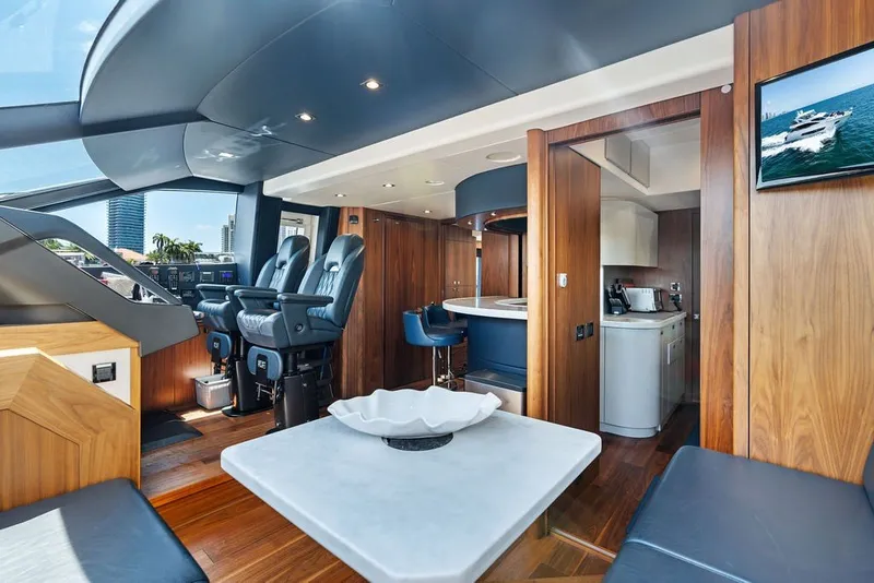 Slide: The Image of Luxurious interior of 2019 Sunseeker 86 Yacht with modern helm and seating area. - 115