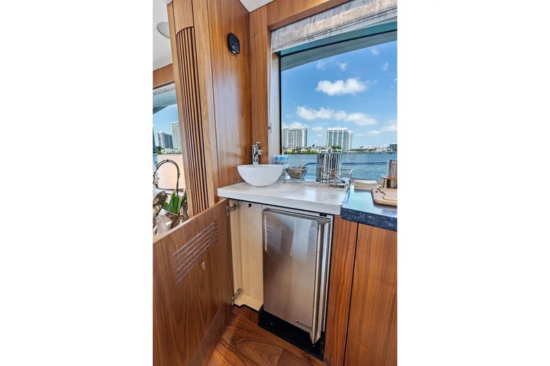 Slide: The Image of Luxurious interior of 2019 Sunseeker 86 Yacht with ocean view through window. - 109
