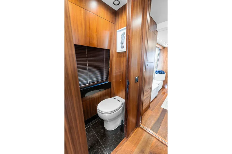 Slide: The Image of Luxurious wooden interior bathroom on 2019 Sunseeker 86 Yacht, featuring modern design and amenities. - 131