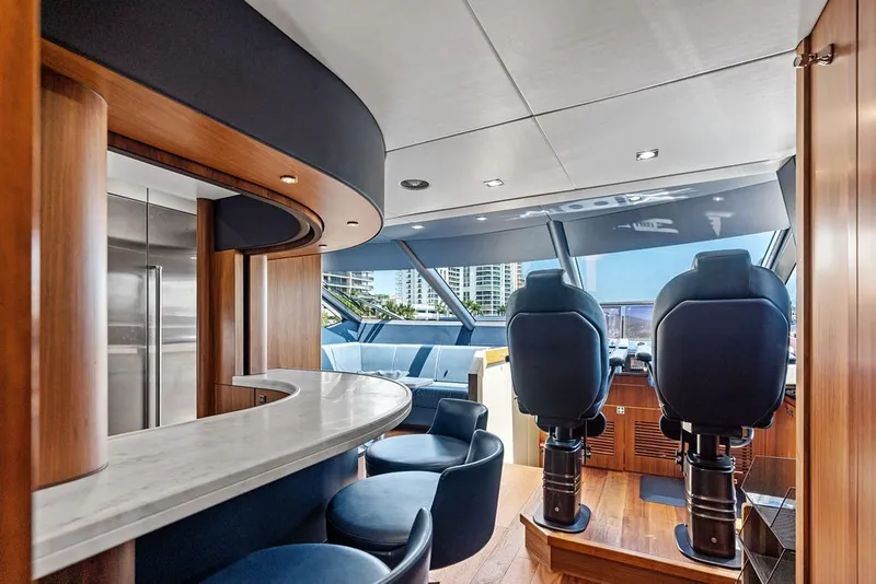 Slide: The Image of Luxurious interior of 2019 Sunseeker 86 Yacht with modern helm and seating area. - 110
