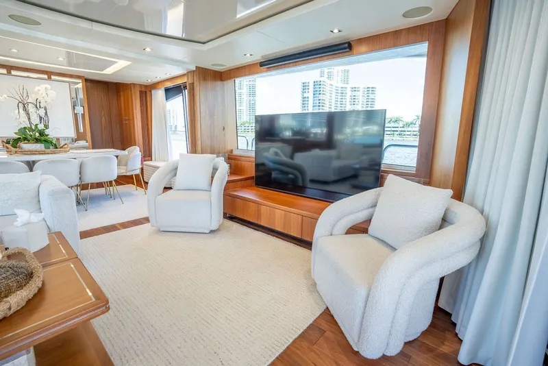 Slide: The Image of Luxurious 2019 Sunseeker 86 Yacht interior with elegant seating and large TV. - 67