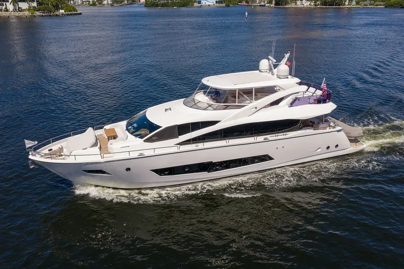 Slide: The Image of Luxurious 2019 Sunseeker 86 Yacht cruising on serene waters. - 14