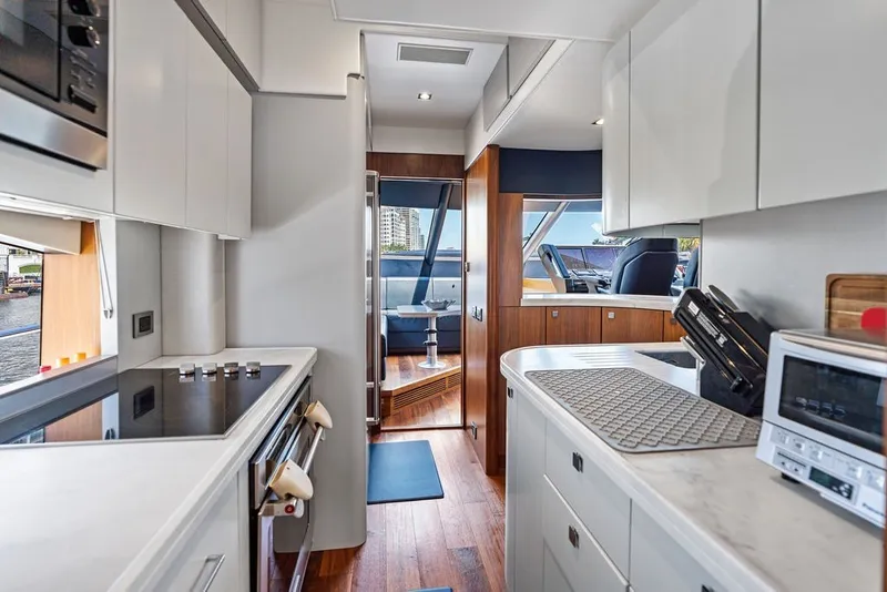 Slide: The Image of Luxurious interior of 2019 Sunseeker 86 Yacht with modern kitchen and sleek design. - 128