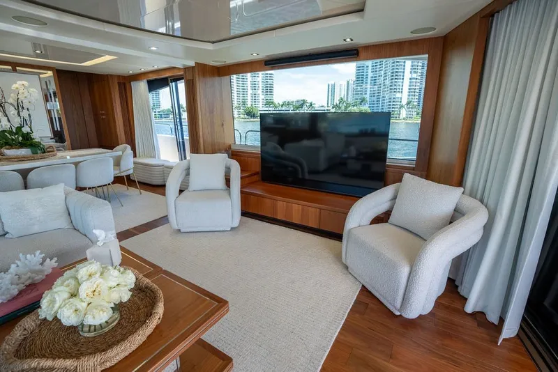 Slide: The Image of Luxurious interior of 2019 Sunseeker 86 Yacht with elegant seating and large windows. - 62