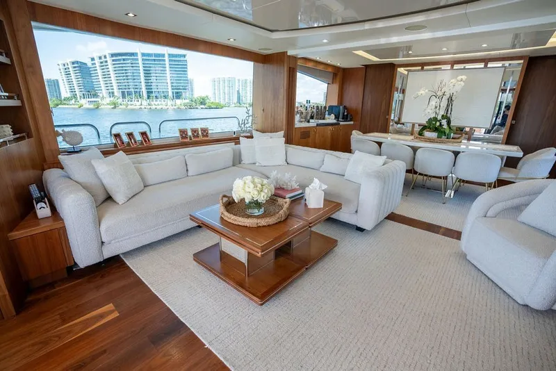 Slide: The Image of Luxurious interior of 2019 Sunseeker 86 Yacht with elegant seating and waterfront view. - 61