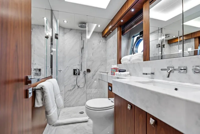 Slide: The Image of Luxurious bathroom on 2019 Sunseeker 86 Yacht, featuring marble finishes and modern fixtures. - 94