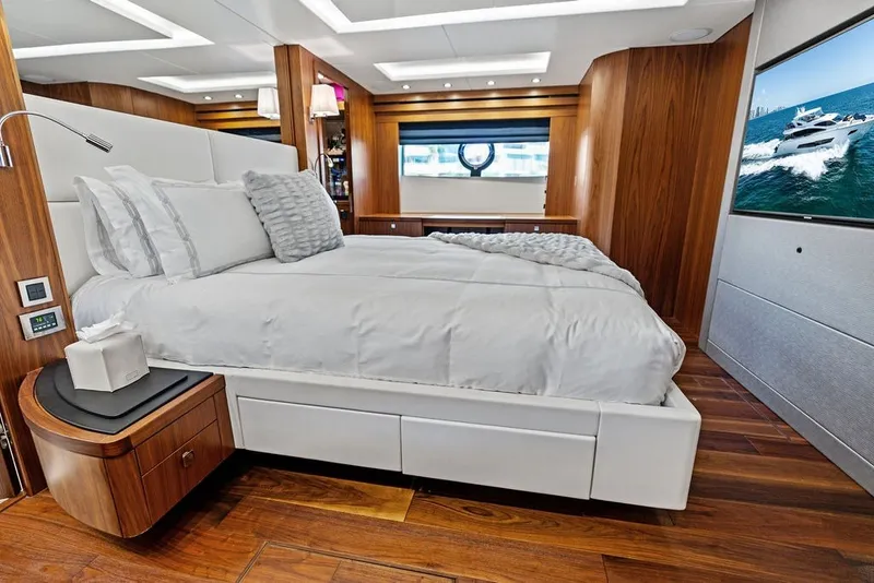 Slide: The Image of Luxurious bedroom interior of 2019 Sunseeker 86 Yacht with elegant wood finishes and modern amenities. - 72