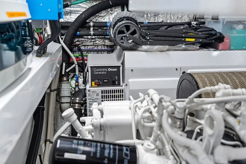 Slide: The Image of Engine room of 2019 Sunseeker 86 Yacht featuring Cummins Onan generator. - 147