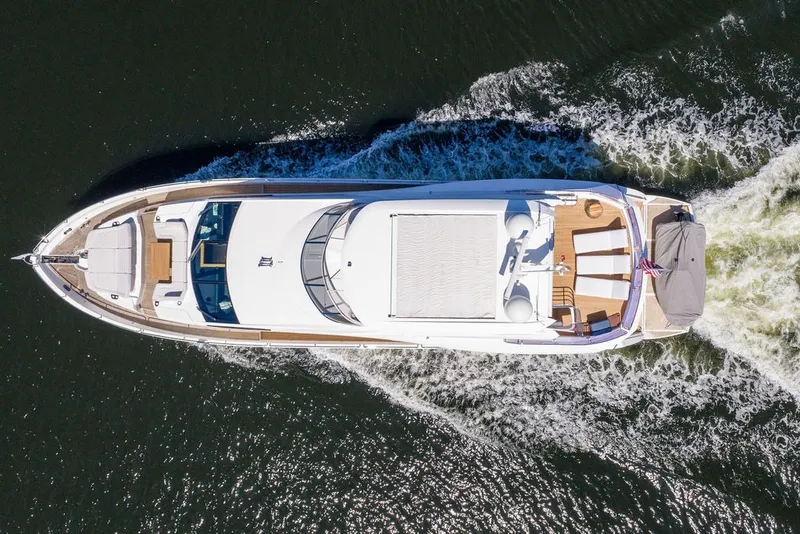 Slide: The Image of Aerial view of 2019 Sunseeker 86 Yacht cruising on open water. - 20