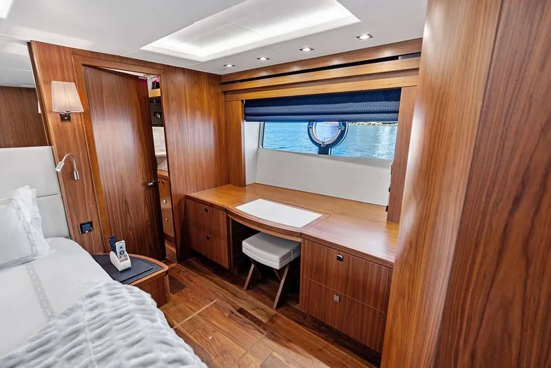 Slide: The Image of Luxurious interior of 2019 Sunseeker 86 Yacht with elegant wood finish and ocean view. - 75