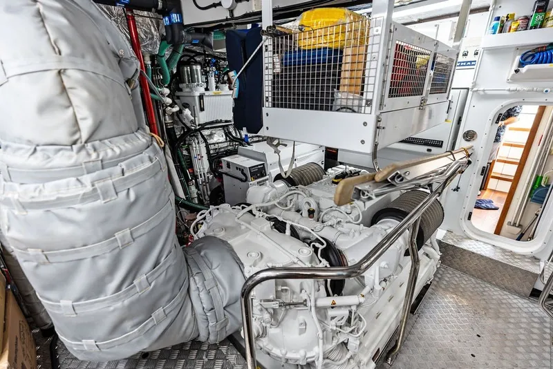 Slide: The Image of Engine room of a 2019 Sunseeker 86 Yacht, showcasing advanced machinery and equipment. - 140