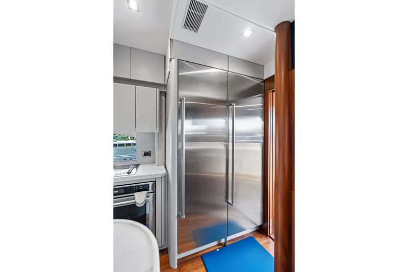 Slide: The Image of Modern kitchen interior on 2019 Sunseeker 86 Yacht with stainless steel appliances. - 125