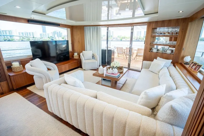Slide: The Image of Luxurious interior of 2019 Sunseeker 86 Yacht with elegant seating and large windows. - 64
