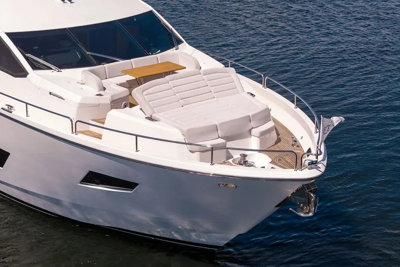 Slide: The Image of Luxurious 2019 Sunseeker 86 Yacht with spacious deck and elegant seating on water. - 8