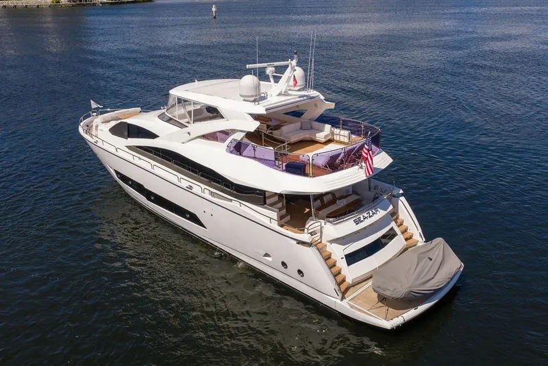 Slide: The Image of Luxurious 2019 Sunseeker 86 Yacht cruising on serene waters, showcasing elegant design and spacious decks. - 13