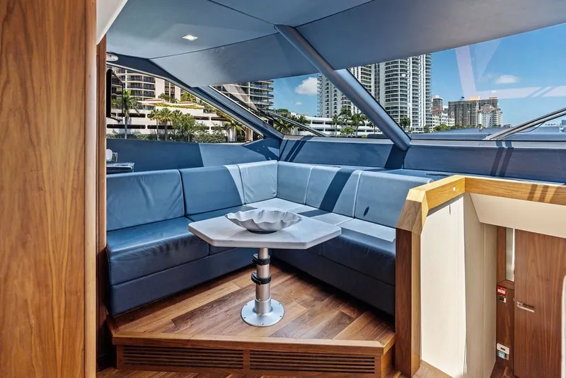 Slide: The Image of Luxurious interior of 2019 Sunseeker 86 Yacht with blue seating and modern design. - 111