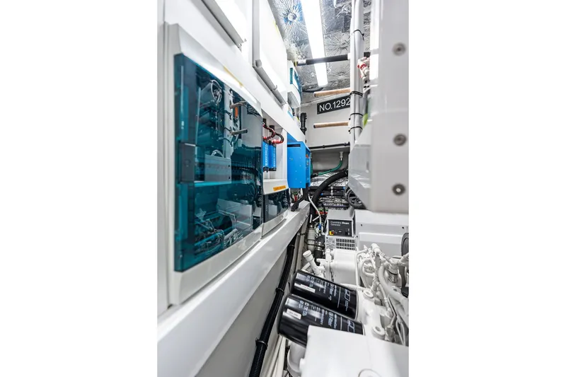 Slide: The Image of Engine room of 2019 Sunseeker 86 Yacht, showcasing advanced mechanical systems and components. - 145