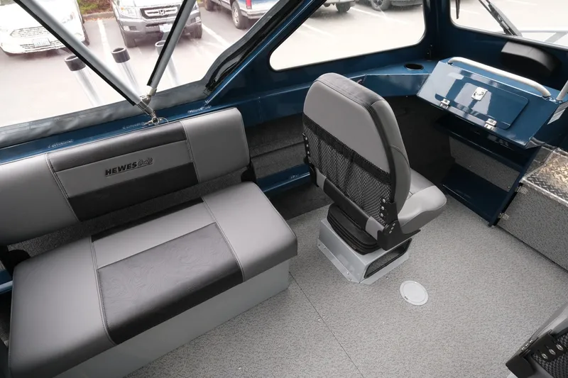 Slide: The Image of Interior of 2023 Hewescraft 200 ProV ET boat with seating and dashboard. - 10